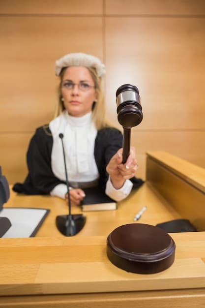 A judge's gavel striking a sound block in a courtroom, symbolizing the legal proceedings of an antitrust lawsuit.