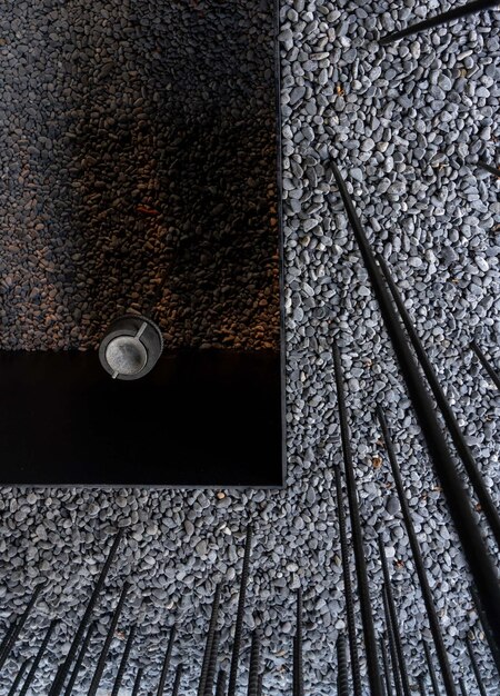 A close-up of various construction materials, such as steel beams, cement bags, and asphalt samples. The composition highlights the diversity of materials needed for infrastructure projects.