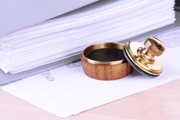 A gavel resting on a stack of tax documents, symbolizing the legal and compliance aspects of the Employee Retention Credit. The image conveys a sense of authority and the importance of adhering to regulations.