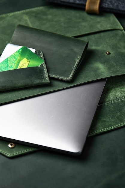A close-up photo of a hardware wallet device connected to a laptop. The screen of the laptop showcases a secure login interface with multi-factor authentication enabled.