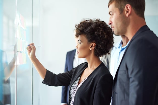 Two entrepreneurs in a modern office, looking thoughtfully at a whiteboard covered with business strategies. The atmosphere is collaborative and focused.