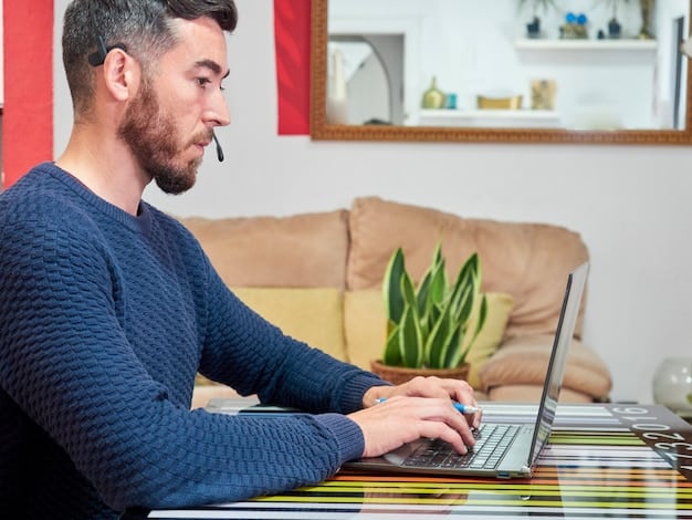A close-up of a freelancer working on a project on their laptop from a co-working space, communicating with a client via video call. The background shows other professionals collaborating.