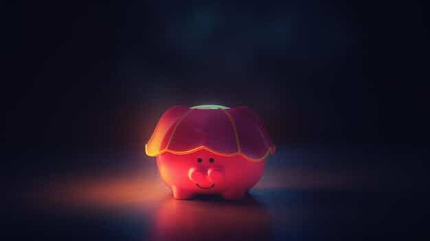 A person placing cash into a piggy bank labeled 