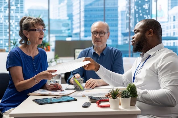 A diverse group of people discussing health insurance options with an insurance agent in a modern office setting. The atmosphere is collaborative and informative.