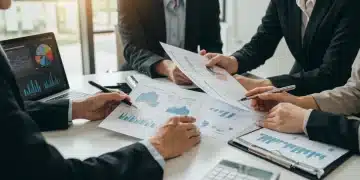 Financial advisor explaining 2026 charitable giving strategies to clients